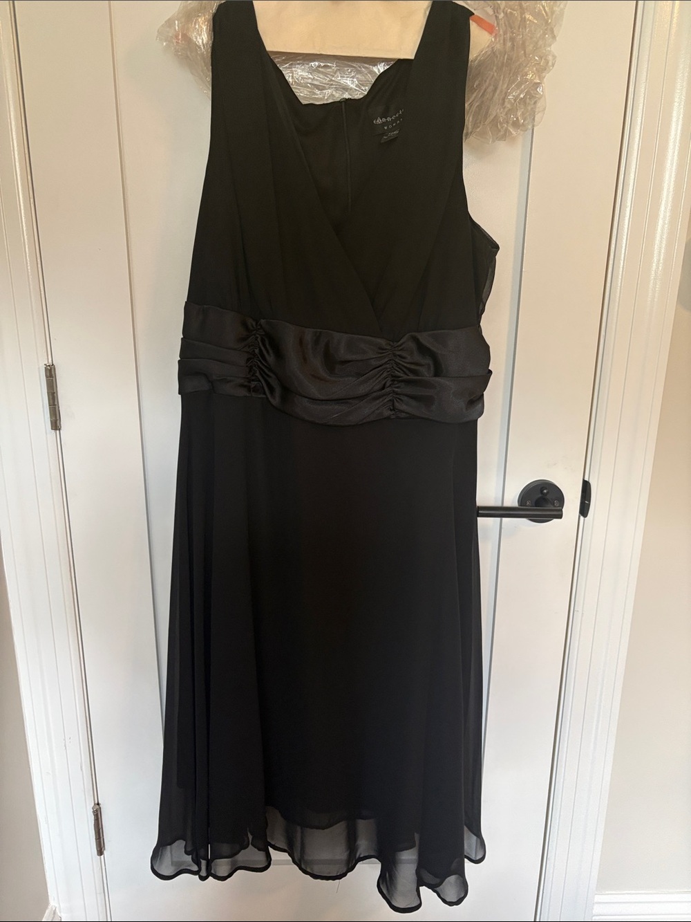 Connected woman black sleeveless midi dress with satin ruched waist. Size 20.